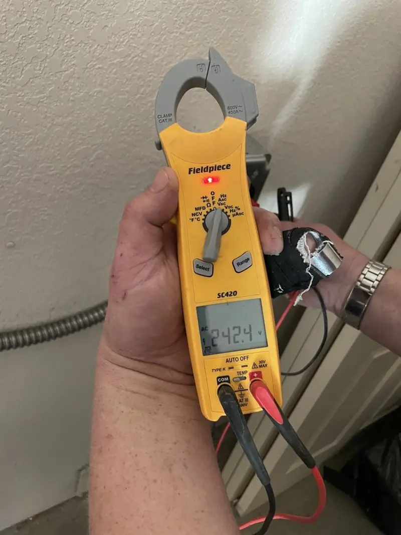 Voltage testing with clamp meter during Whole House Surge Protector in Steubenville
